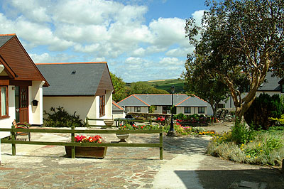 This is the view from Bramblewood's front terrace over the small complex at Trevalgas Cottages 