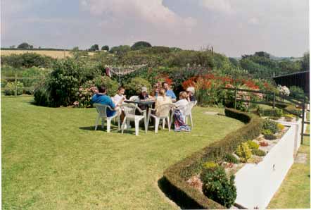 Enjoying a meal in the garden in August